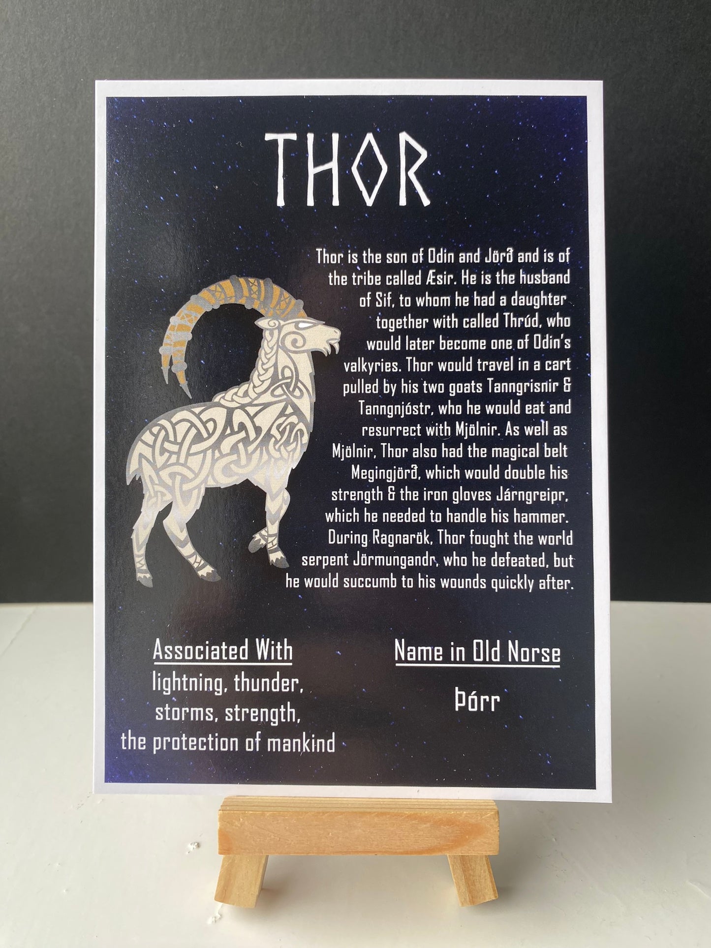 Postcard of Norse god Thor. Postcard contains information about the god and an image of them.