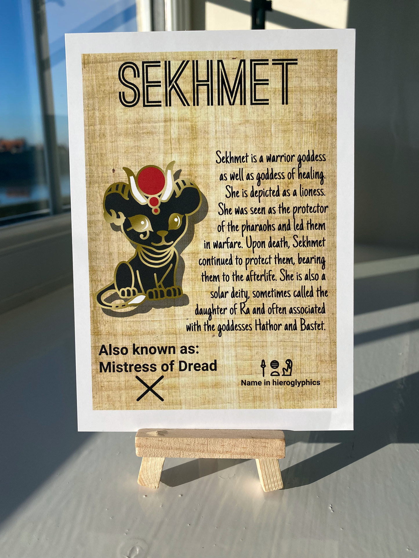 Postcard of the Egyptian god Sekhmet. Contains information of the god.