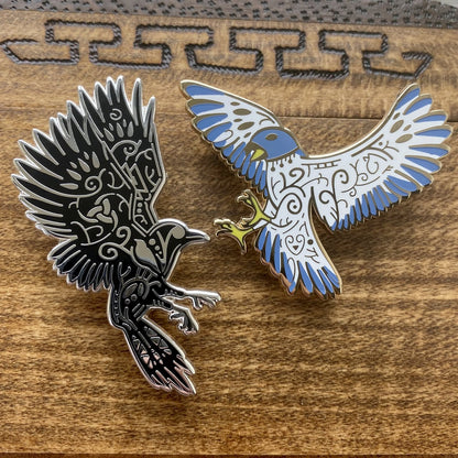 Norse god Odin, depicted as a raven enamel pin. The pin is silver plated and contains knotwork. Paired with an enamel pin of Freyja.